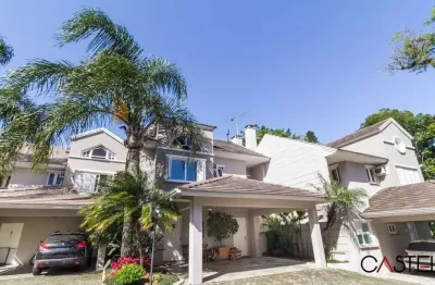 Casa em condomínio fechado com 4 quartos à venda na avenida coronel marcos, 483, pedra redonda, porto alegre por r$ 1.550.000