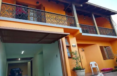 Casa com 3 quartos à venda na Rua Henrique Arlindo Casali, Vila Nova, Porto Alegre