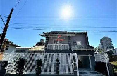 Sobrado com 03 quartos  01 suite  e ampla area gourmet    praia de picarras   santa catarina sc