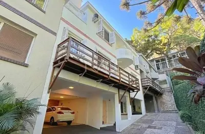 Casa em condomínio fechado com 4 quartos à venda na avenida coronel marcos, 550, pedra redonda, porto alegre por r$ 980.000