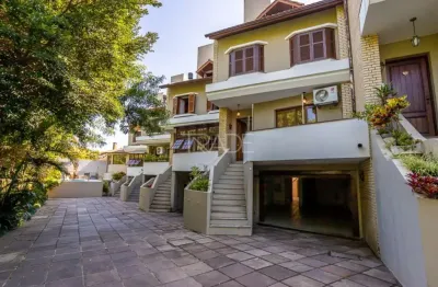 Casa em condomínio fechado com 4 quartos à venda na rua padre joão batista reus, 438, tristeza, porto alegre por r$ 1.490.000