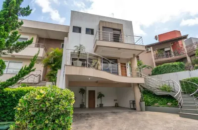 Casa em condomínio fechado com 3 quartos à venda na avenida edgar pires de castro, 540, hípica, porto alegre por r$ 1.150.000