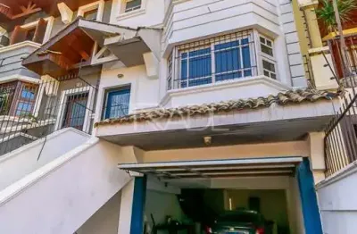 Casa com 3 quartos à venda na rua almirante mariath, 168, tristeza, porto alegre por r$ 990.000