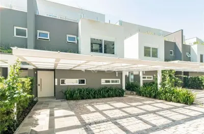 Casa em condomínio fechado com 3 quartos à venda na rua doutor ney de castilhos ferreira, 300, pedra redonda, porto alegre por r$ 2.450.000