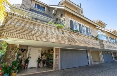 Casa em condomínio fechado com 5 quartos à venda na rua doutor arnaldo da silva ferreira, 450, jardim isabel, porto alegre por r$ 1.600.000