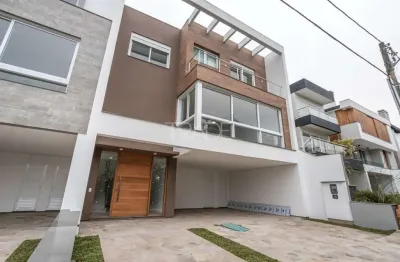 Casa em condomínio fechado com 3 quartos à venda na rua ivo walter kern, 599, hípica, porto alegre por r$ 1.595.000