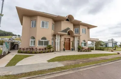 Casa em condomínio fechado com 3 quartos à venda na estrada das três meninas, 2000, vila nova, porto alegre por r$ 2.850.000