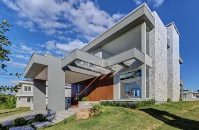 Casa em condomínio fechado com 4 quartos à venda na estrada das três meninas, 2000, vila nova, porto alegre por r$ 2.690.000