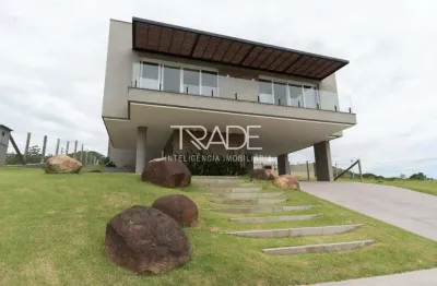 Casa em condomínio fechado com 3 quartos à venda na estrada das três meninas, 1501, vila nova, porto alegre por r$ 1.950.000