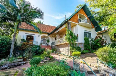 Casa com 4 quartos à venda na rua doutor possidônio cunha, 16, vila assunção, porto alegre por r$ 1.590.000