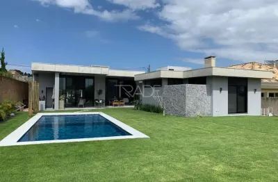 Casa em condomínio fechado com 4 quartos à venda na avenida juca batista, 8000, belém novo, porto alegre por r$ 3.250.000