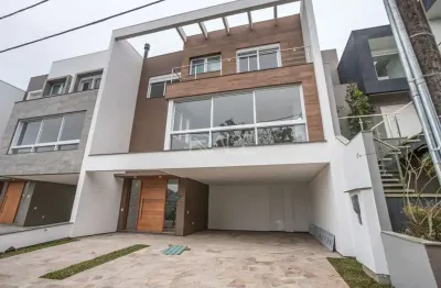 Casa em condomínio fechado com 3 quartos à venda na rua ivo walter kern, 599, hípica, porto alegre por r$ 1.670.000