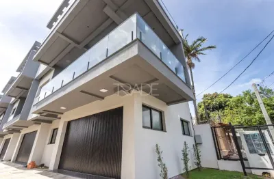 Casa em condomínio fechado com 3 quartos à venda na travessa nova trento, 364, tristeza, porto alegre por r$ 1.690.000