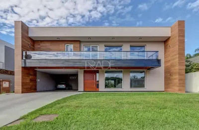 Casa em condomínio fechado com 5 quartos à venda na avenida juca batista, 8000, belém novo, porto alegre por r$ 5.660.000