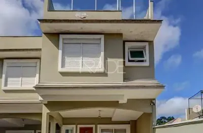 Casa em condomínio fechado com 4 quartos à venda na rua doutor mário totta, 1191, tristeza, porto alegre por r$ 998.000