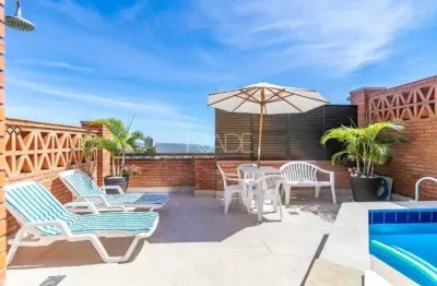 Casa em condomínio fechado com 3 quartos à venda na avenida jacuí, 978, cristal, porto alegre por r$ 1.290.000