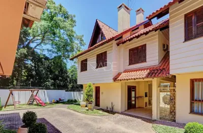 Casa em condomínio fechado com 3 quartos à venda na rua luís felipe monmany, 101, guarujá, porto alegre por r$ 498.000