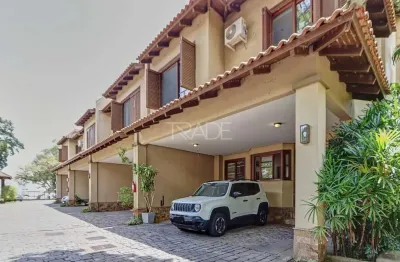 Casa em condomínio fechado com 3 quartos à venda na Rua Padre João Batista Reus, 68, Tristeza, Porto Alegre por R$ 1.390.000