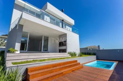 Casa em condomínio fechado com 4 quartos à venda na estrada das três meninas, 2001, vila nova, porto alegre por r$ 2.390.000