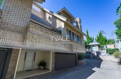 Casa em condomínio fechado com 3 quartos à venda na rua doutor arnaldo da silva ferreira, 450, jardim isabel, porto alegre por r$ 1.300.000
