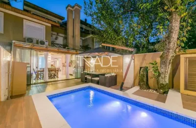 Casa em condomínio fechado com 3 quartos à venda na Rua Goitacaz, 606, Vila Assunção, Porto Alegre por R$ 1.700.000