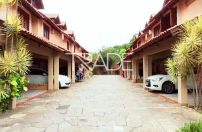 Casa em condomínio fechado com 3 quartos à venda na rua doutor possidônio cunha, 273, vila assunção, porto alegre por r$ 720.000