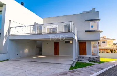 Casa em condomínio fechado com 3 quartos à venda na rua ivo walter kern, 599, hípica, porto alegre por r$ 1.080.000