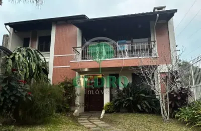 Casa com 4 quartos à venda na rua upamaroti, 836, cristal, porto alegre por r$ 1.390.000