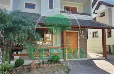 Casa em condomínio fechado com 3 quartos à venda na avenida edgar pires de castro, 540, aberta dos morros, porto alegre por r$ 1.100.000