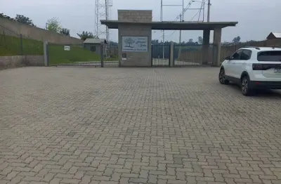 Terreno de 372,08 m², em condomínio fechado, para venda