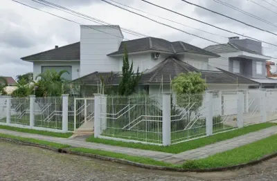 Casa de 385 m², com 04 dormitórios (sendo um deles uma suíte), para venda