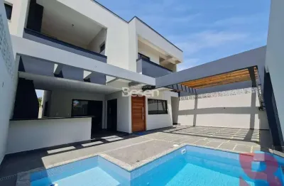 Sobrado novo 03 suítes e piscina - excelente padrão de acabamento, localizado no baln. rainha do mar