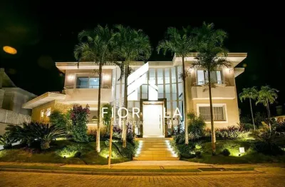 Casa luxuosa com piscina e mobiliada de 05 dormitórios, sendo 04 suítes, jurerê internacional em fpolis.
