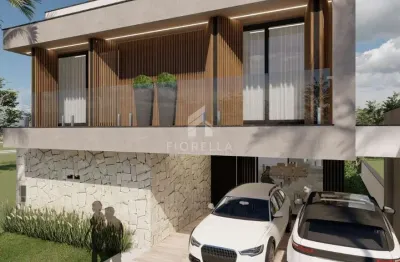 Casa alto padrão de 03 dormitórios, sendo 01 suíte master + 02 amplas suítes no condomínio reserva da pedra, bairro pedra branca - palhoça/sc