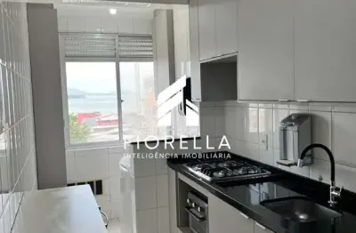 Apartamento à venda, com vista mar, 02 dormitórios, 01 vaga, no bairro praia comprida, são josé/sc.