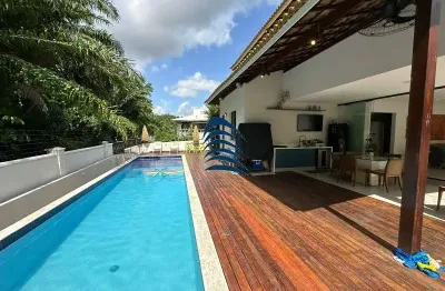 Casa recém reformada no alphaville litoral norte 1 com 462m² de terreno e 271m² de área construída, fino acabamento, porteira fechada
