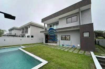 Casa recém construída no alphaville litoral norte 1 4 suítes sendo 3 no pavimento superior e 1 no térreo. suítes do pavimento superior com closet