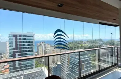Apartamento finamente decorado e mobiliado, 2/4 sendo 1 suíte, no nau barra, 67m2, andar alto, com vista mar lateral, para o farol da barra.
