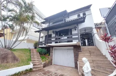 Casa com 5 dormitórios para alugar, 382 m² por r$ 7.000,00/mês - tristeza - port