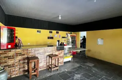 Salão comercial em terra preta com casa nos fundos à venda