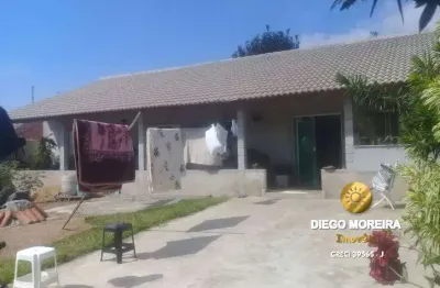 Casa com excelente terreno á venda em terra preta, bem localizada.