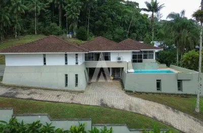 Casa com 2 suíte(s) mais 2 quarto(s) à venda no bairro saguaçu em joinville, de r$ 3.200.000,00 por r$ 2.800.000.00.