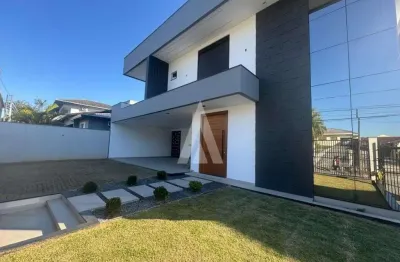 Casa com 3 suítes e 2 quartos à venda no bairro glória em joinville-sc por r$3.600.000,00.