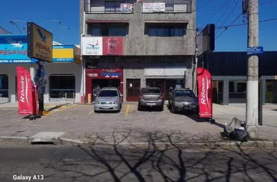 Prédio comercial  com 03 andares com 02 lojas térreas, 09 salas comerciais transformadas em aptos, alugadas