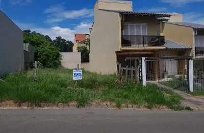 Ótimo terreno com 08 x 25 ( 200m²) limpo, entre residencias de médio padrão,  com vista para o guaiba, documentação em dia.