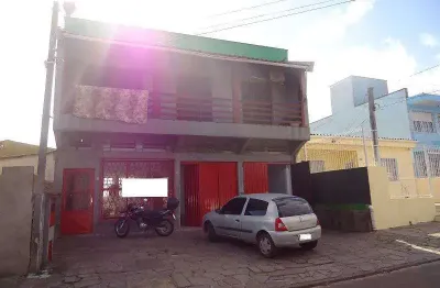 Cod.imóvel: 1995 - loja no bairro santa tereza com 200 m2, 2 dormitórios, banheiro auxiliar, banheiro social, cozinha, depósito, despensa, garagem, tanque