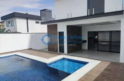 Sobrado 3 quartos 2 suítes  pé na areia  condominio alto padrão itanhaém sp