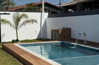 Casa nova pé na areia 3 quartos piscina área gourmet 50m mar  itanhaém sp
