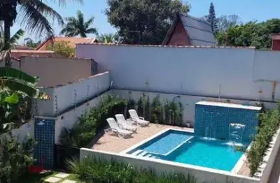 Ótimo sobrado mobiliado em condomínio com piscina 300 m do mar itanhaém sp