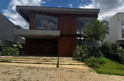 Casa de luxo em condomínio Alphaville Nova Esplanada: 4 quartos, 4 suítes, 3 salas, 5 banheiros, 4 vagas, 342m². Votorantim-SP.
